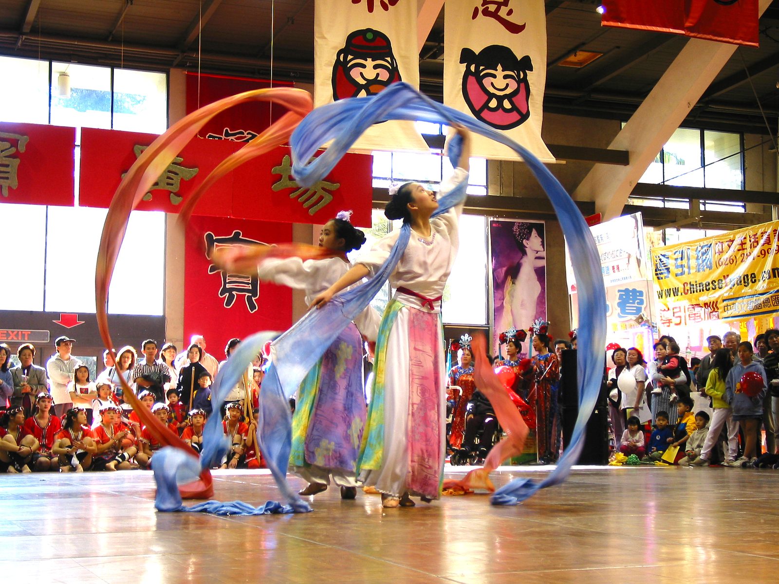 Ribbon dancers swirling silk streamers